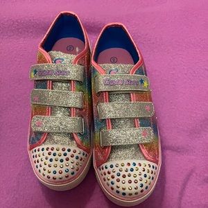 Brand new size 2, multi-colored light up Skechers!!
